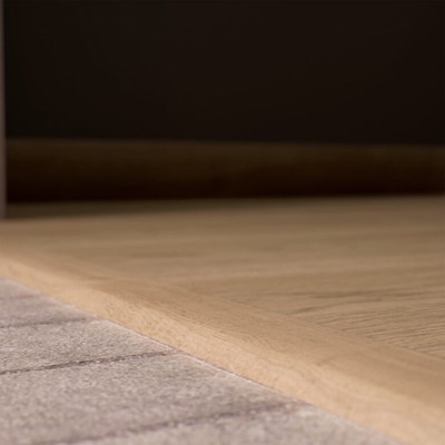 JUNTA TRANSICION SUELO LAMINADO